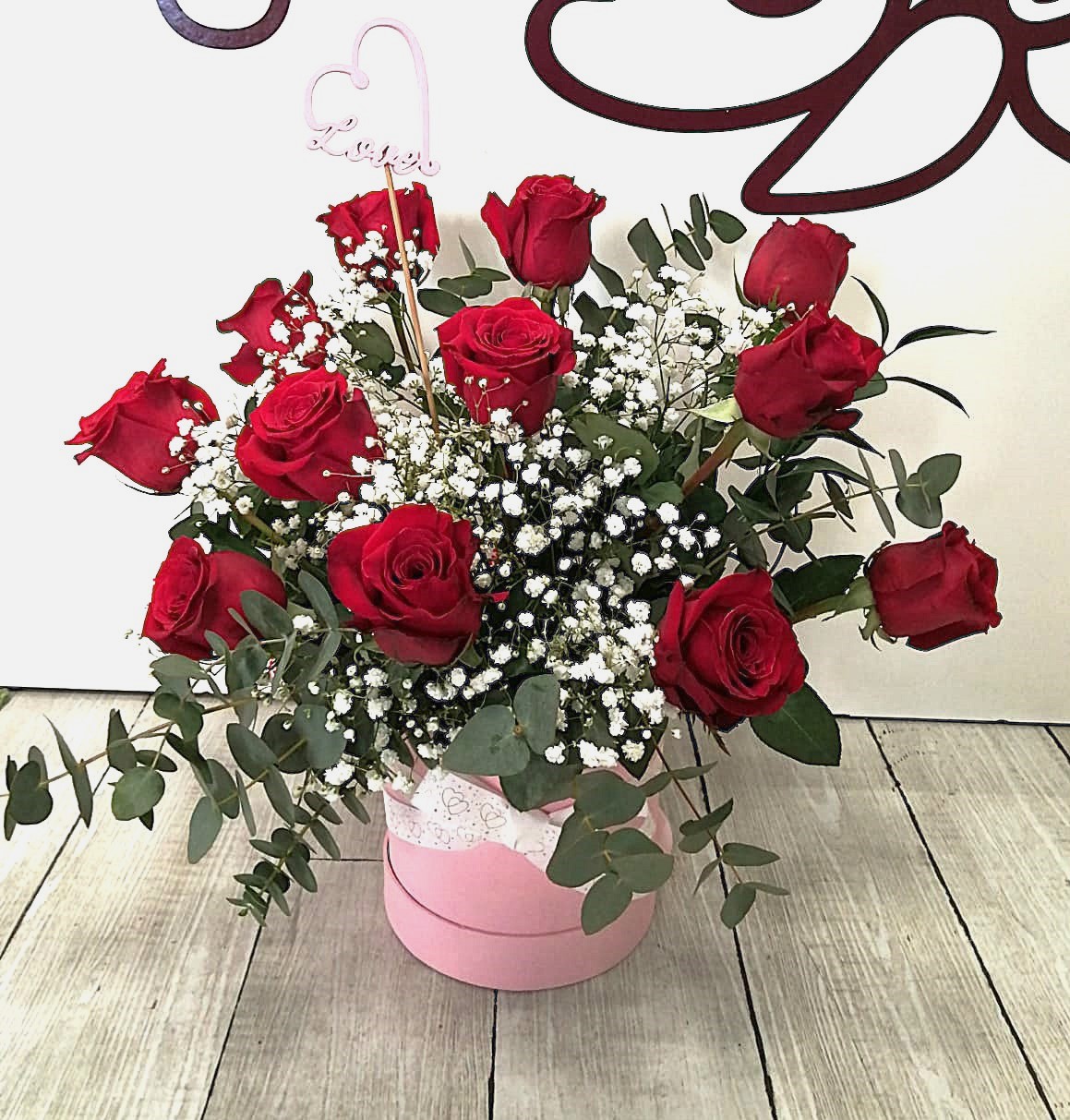 Caja de 12 rosas rojas naturales