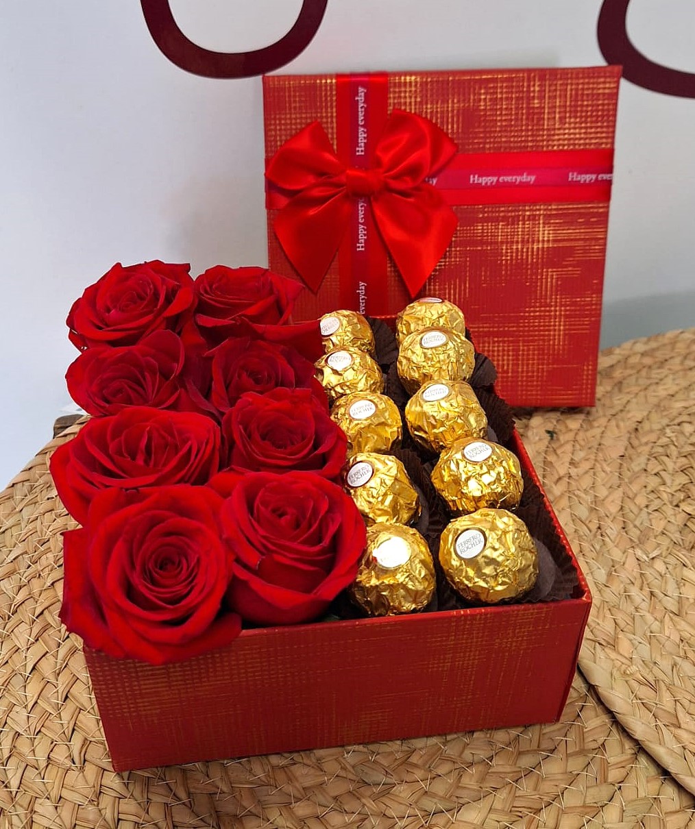 Caja con 8 rosas rojas naturales y bombones Ferrero Rocher
